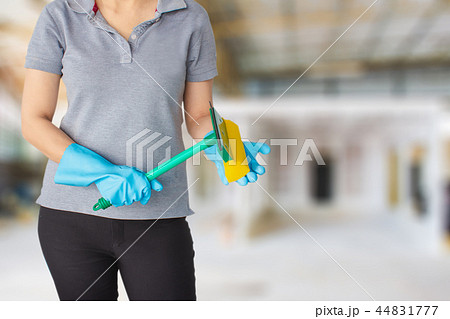 Female cleaning staff in bathroom 44831777