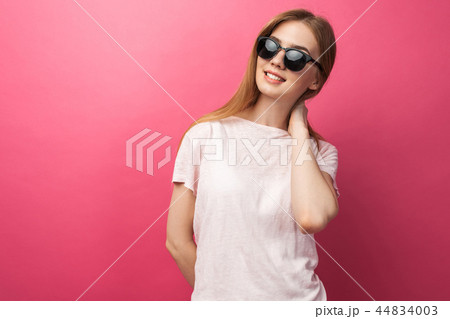 Beautiful young blonde girl in glasses  44834003