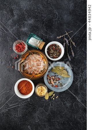 Black food background with spices. 44834942