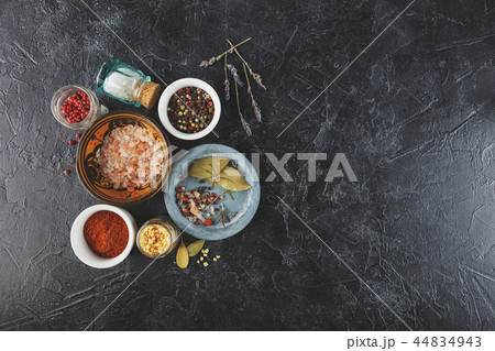 Black food background with spices. 44834943