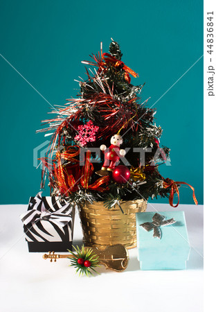 Christmas tree with gifts and a violin 44836841