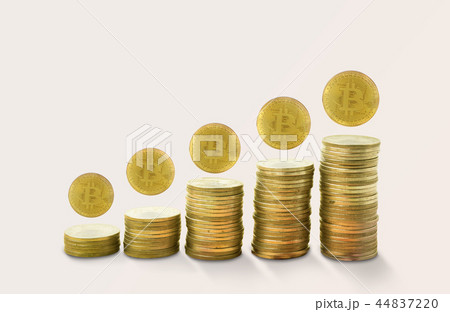 stacks of gold coins income with bitcoin. stacks of gold coins income with bitcoin. 44837220