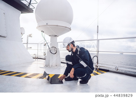 Service technician or serviceman near VSAT terminal 44839829