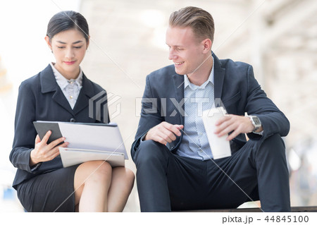 Businessman Discussing With Beautiful Partner. Businessman Discussing With Beautiful Partner. 44845100