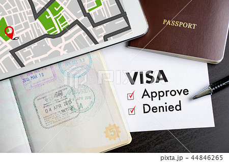 Visa and passport to approved stamped on a  44846265