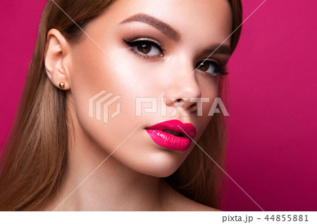 Close-up portrait of beautiful woman with bright make-up 44855881