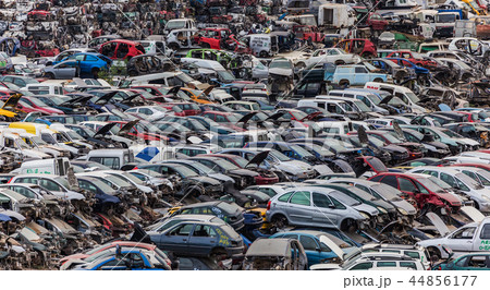 Car junkyard full of wrecks cars. Car junkyard full of wrecks cars. 44856177