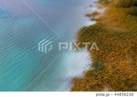 Turquoise water of lake powered by power plant Turquoise water of lake powered by power plant 44856236