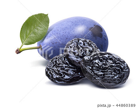 Blue fresh and dry plums isolated on white Blue fresh and dry plums isolated on white 44860389