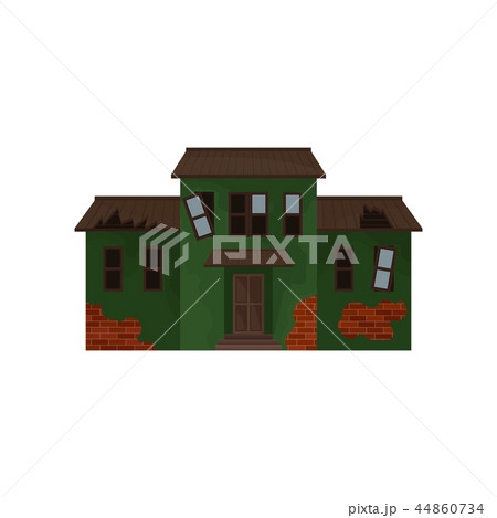Abandoned brick home with green peeling paint, broken windows and roof. Old house. Facade of cottage 44860734
