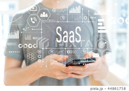 SaaS with man using a smartphone SaaS with man using a smartphone 44861758