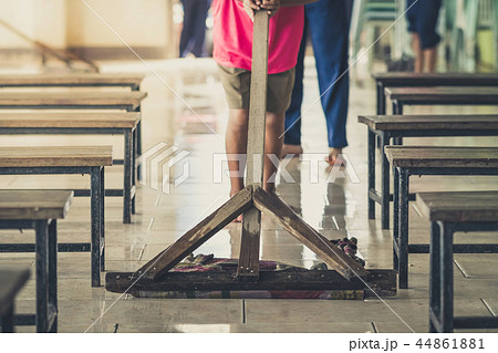 Students help to rub the floor in the canteen 44861881