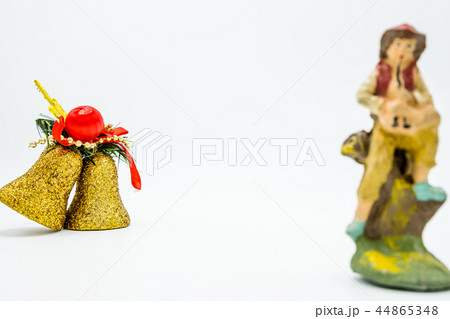 Golden Christmas decoration bells and flutist. 44865348