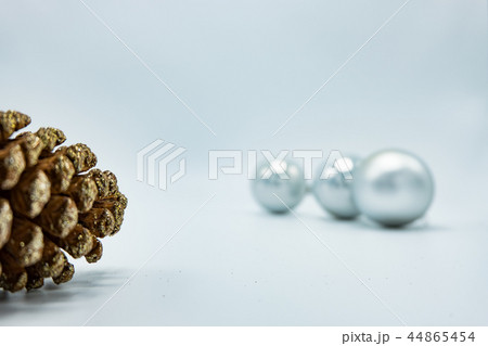 Silver Christmas balls with pine cone. 44865454