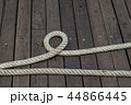 Ship rope on wooden plank floor. Ship rope on wooden plank floor. 44866445