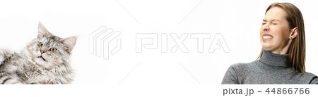 Woman with her cat over white background Woman with her cat over white background 44866766