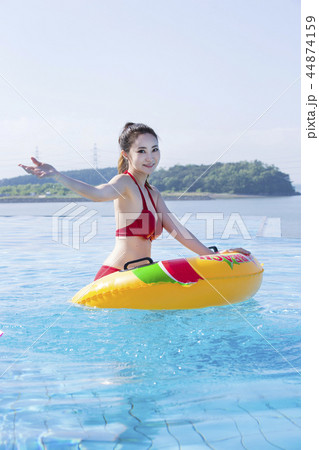 Summer Vacation of beautiful women,having fun in the water 234 44874159