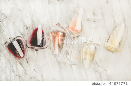 Red, rose, white wine in glasses and corkscrews 44875771