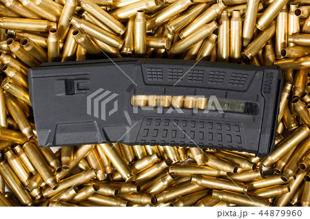 Ammunition and magazine background. Ammo, weapon concept. Ammunition and magazine background. Ammo, weapon concept. 44879960