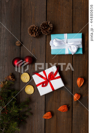 Christmas background Christmas tree and gifts nuts cones Christmas background Christmas tree and gifts nuts cones 44880656