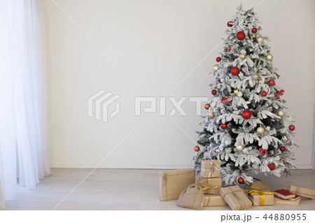 Christmas tree with gifts for the new year 44880955