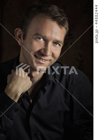 young man smile close up portrait, on black young man smile close up portrait, on black 44882444