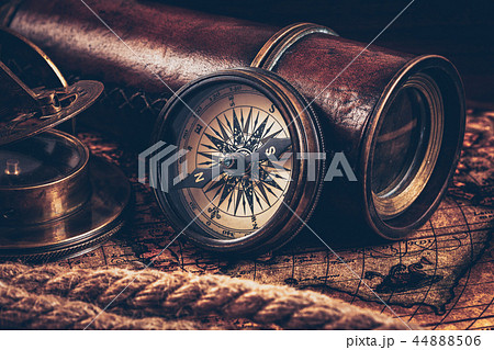 Old vintage compass on ancient map 44888506