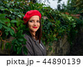 Thoughtful girl in red beret. 44890139