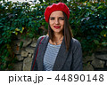 Red beret and smile. 44890148