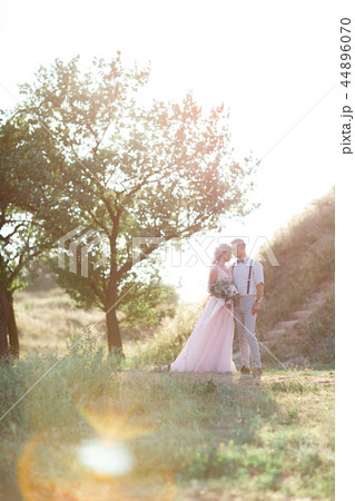 wedding couple on the nature in summer day. wedding couple on the nature in summer day. 44896070
