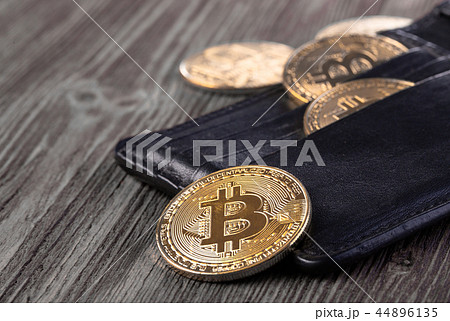 Popular cryptocurrency in leather wallet 44896135