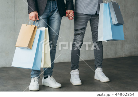 couple shopping leisure man woman holding bags couple shopping leisure man woman holding bags 44902854