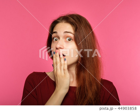 surprised shocked girl cover mouth emotional face surprised shocked girl cover mouth emotional face 44903858
