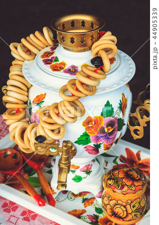 Russian samovar with bagels for tea on a tray Russian samovar with bagels for tea on a tray 44905339