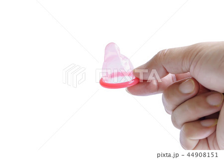 Holds a condom in hand 44908151