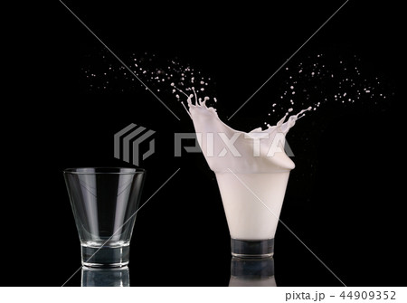 Shoot the glass on a black  44909352