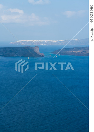 view of Oia town in the distance across the sea, Santorini view of Oia town in the distance across the sea, Santorini 44923960