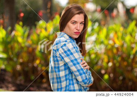 Beautiful young woman folded her arms across chest 44924004