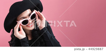 Fashionable woman in sunglasses Fashionable woman in sunglasses 44929887