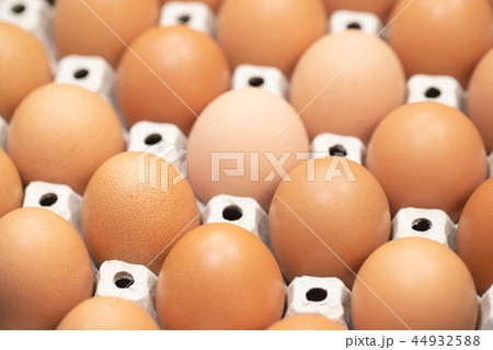 whole eggs in box. Chicken egg on the table. whole eggs in box. Chicken egg on the table. 44932588