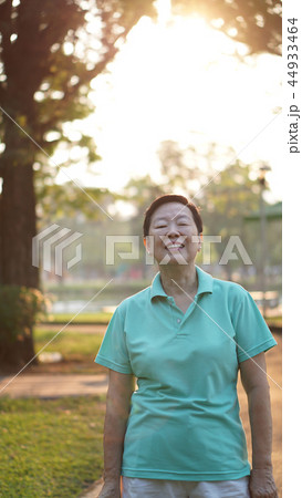 asian senior woman smile in sunshine nature  44933464