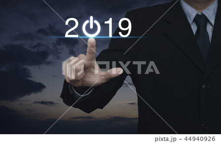 Businessman pressing 2019 start up business icon 44940926
