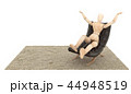 Wooden Dummy Siting on the couch and put your hand 44948519