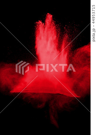 Red powder explosion on black background. 44953715