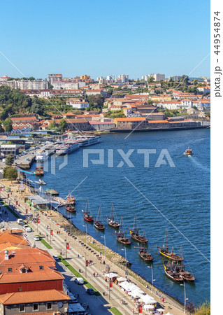 Traditional boats with barrels of wine, on the Douro River in the Portuguese city of Porto. 44954874