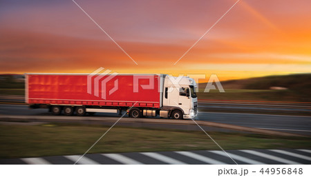 Truck with container on road, cargo transportation concept. 44956848