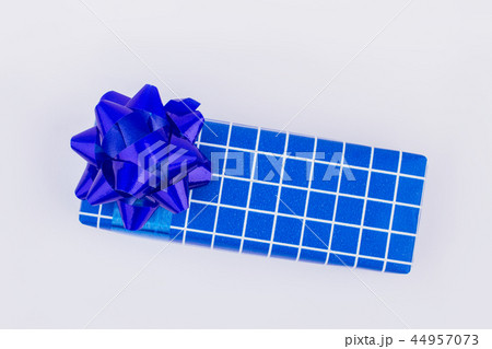 Blue gift box with white plaids. Blue gift box with white plaids. 44957073
