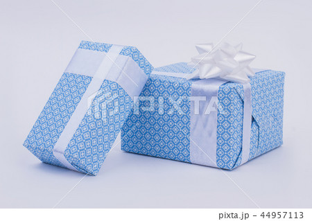 Christmas gifts on light background. Christmas gifts on light background. 44957113
