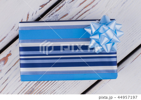 Christmas gift box on wooden background. Christmas gift box on wooden background. 44957197