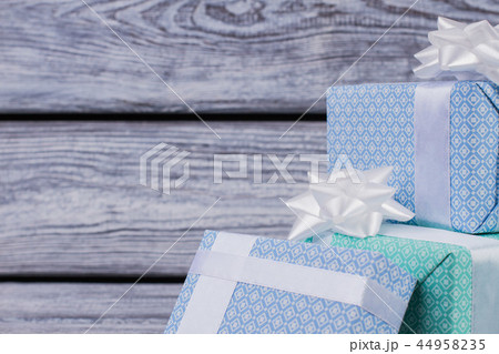 Gift boxes on wooden background. Gift boxes on wooden background. 44958235